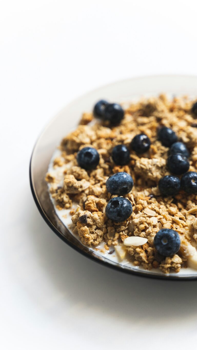Bowl of granola with blueberries and yogurt — real food fuel for runners