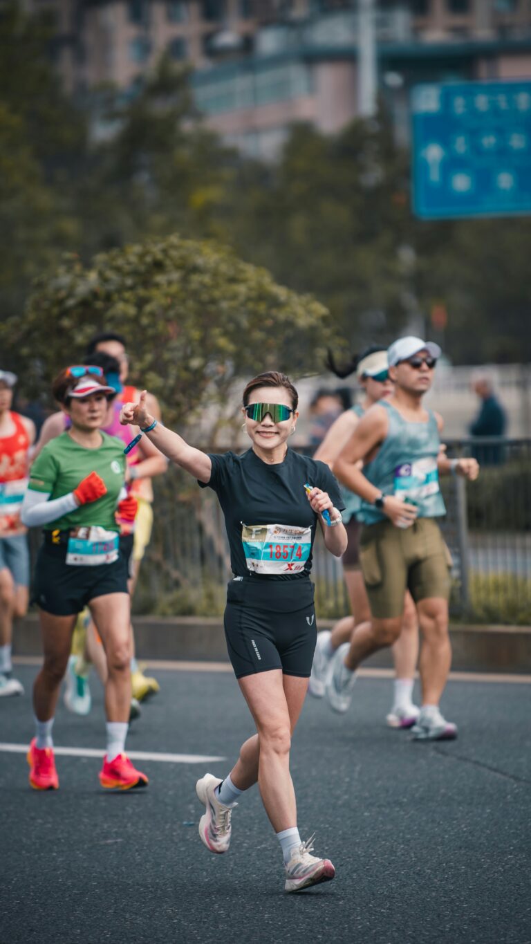 runner holding energy gel during race